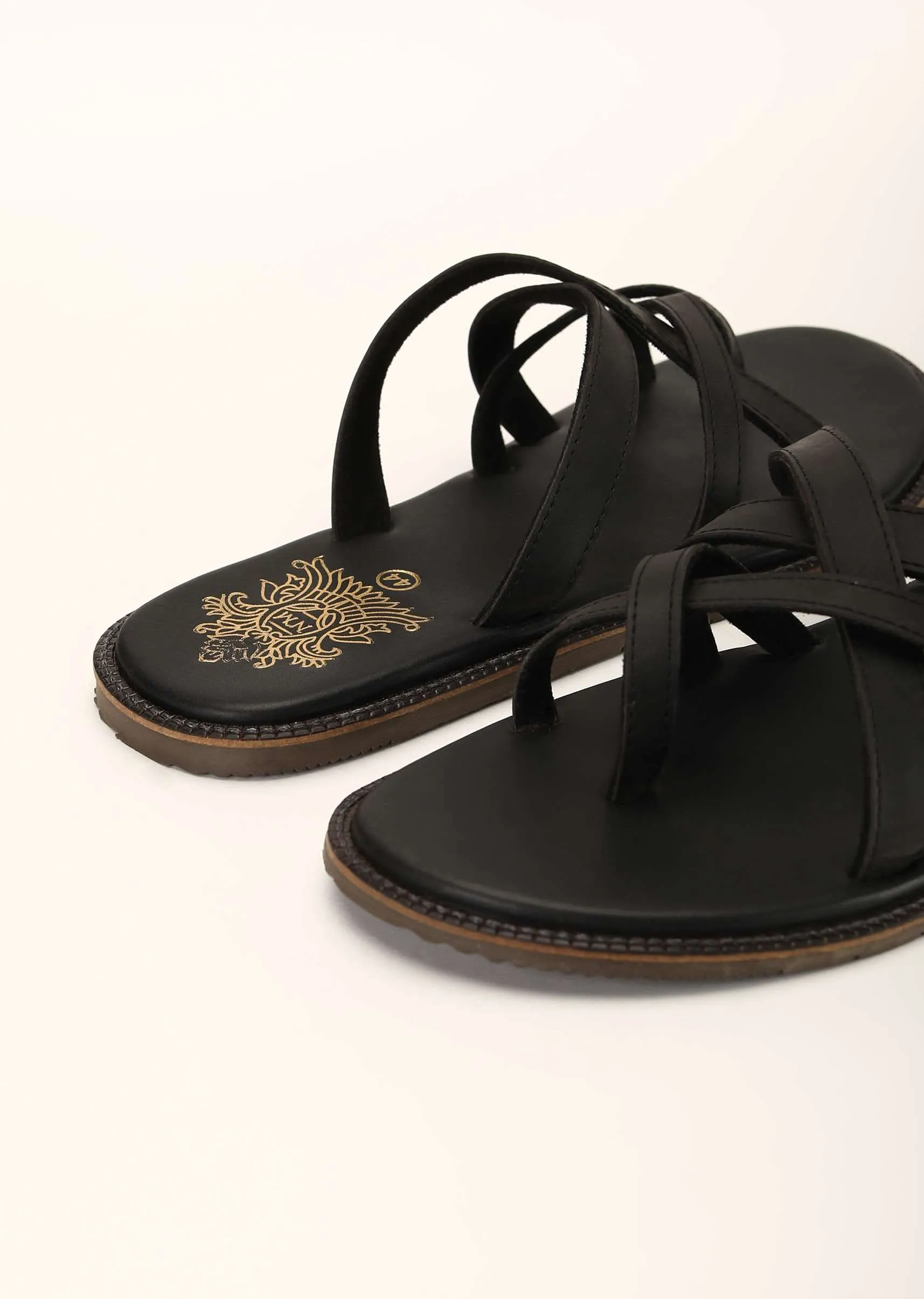 Black Flats In Rexine Leather With Criss Cross Straps